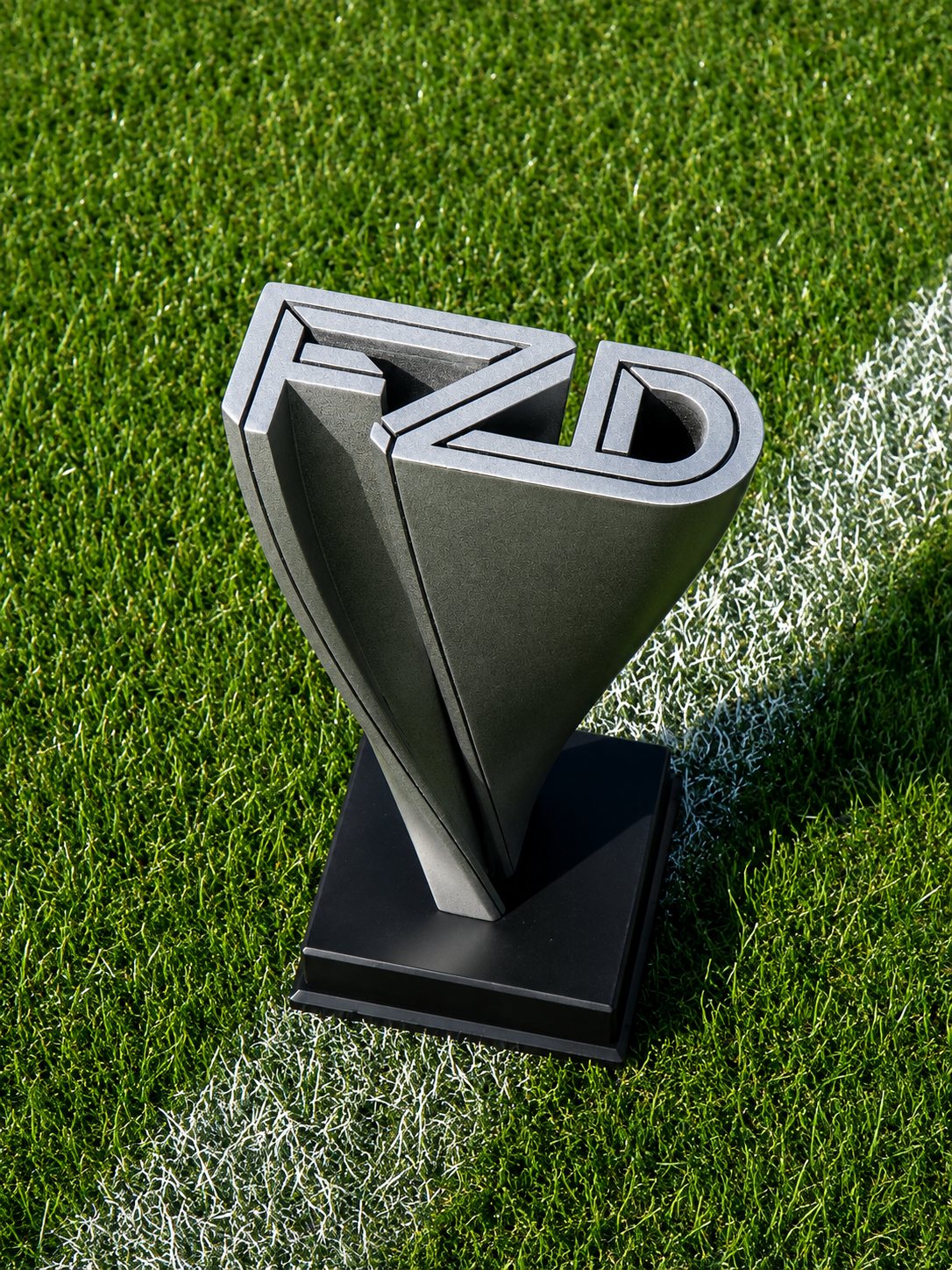 FUZED Trophy on a football pitch